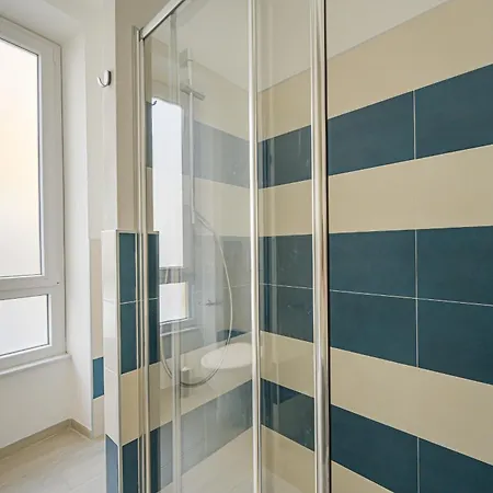 Apartmán Guesthost - La Casa Del Faro - *